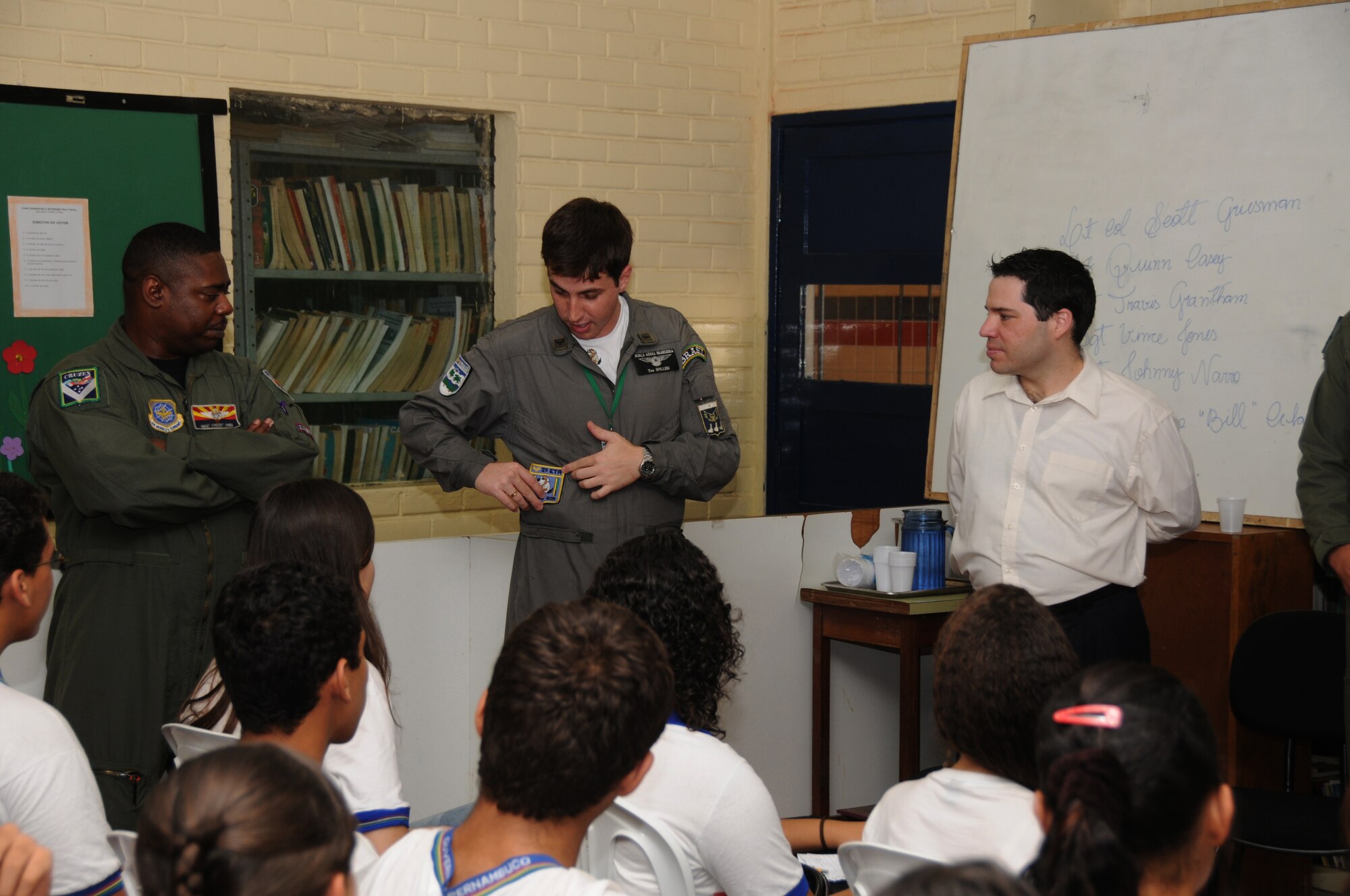 Master Sgt. Vince Jones of the 161st Air Refueling Wing, Phoenix, Ariz., LT Spiller of the Brazilian Air Force and Juan Cruz, Vice Consul,  talk with students from Escola Santos Dumont School on November 11, 2010, in Recife, Brazil . The 161st ARW is participating in CRUZEX V, or Cruzeiro Do Sul (Southern Cross).  CRUZEX  is a multi-national combined exercise involving the Air Forces of Argentina, Brazil, Chile, France and Uruguay, and observers from numerous other countries with more than 82 aircraft and almost 3,000 Airmen involved.  U.S. Air Force Photo by Master Sgt. Kelly M. Deitloff