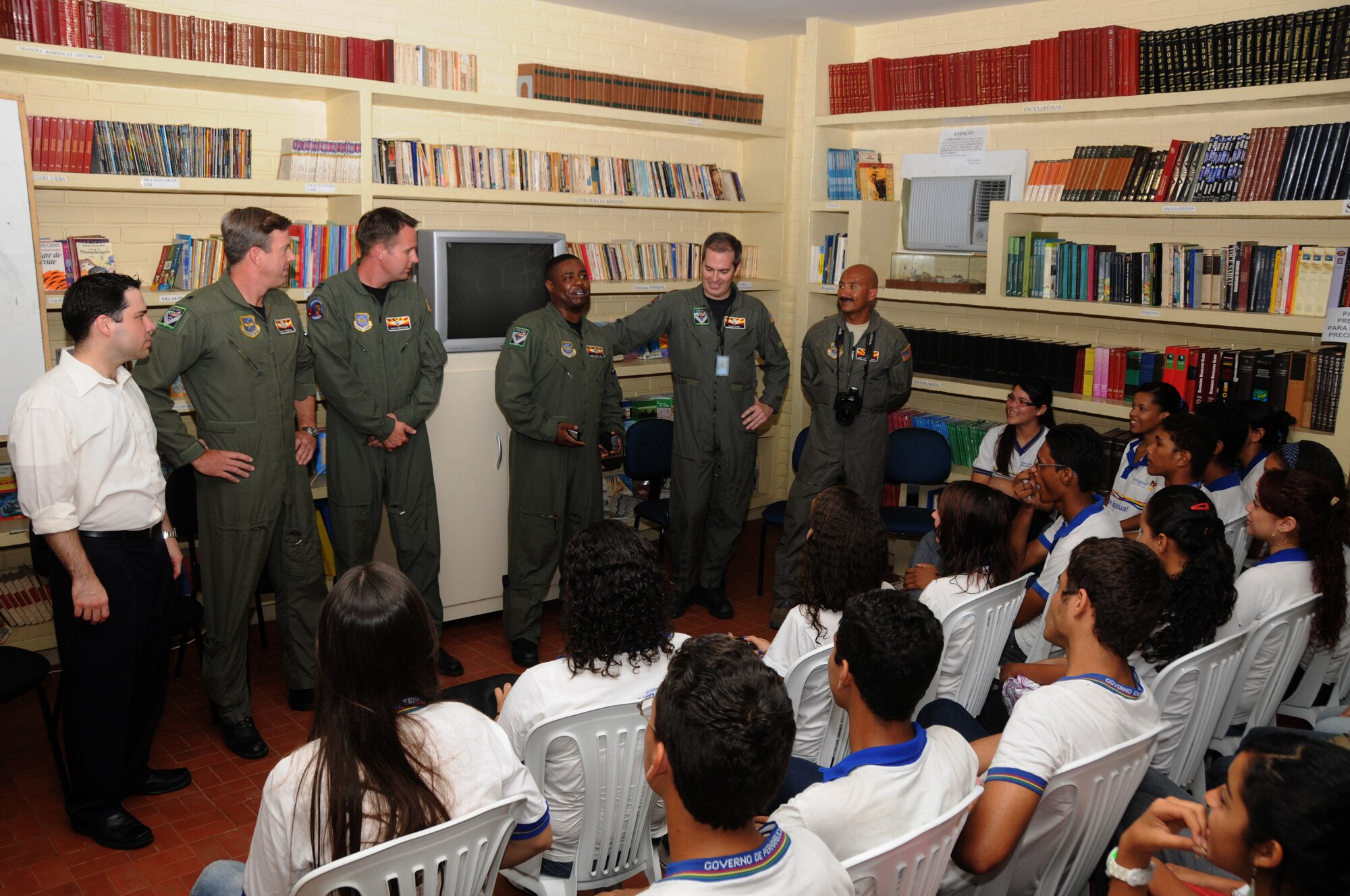 Members from the 161st Air Refueling Wing, Phoenix, Ariz., talk with students from Escola Santos Dumont School on November 11, 2010, in Recife, Brazil . The 161st ARW is participating in CRUZEX V, or Cruzeiro Do Sul (Southern Cross).  CRUZEX  is a multi-national combined exercise involving the Air Forces of Argentina, Brazil, Chile, France and Uruguay, and observers from numerous other countries with more than 82 aircraft and almost 3,000 Airmen involved.  U.S. Air Force Photo by Master Sgt. Kelly M. Deitloff