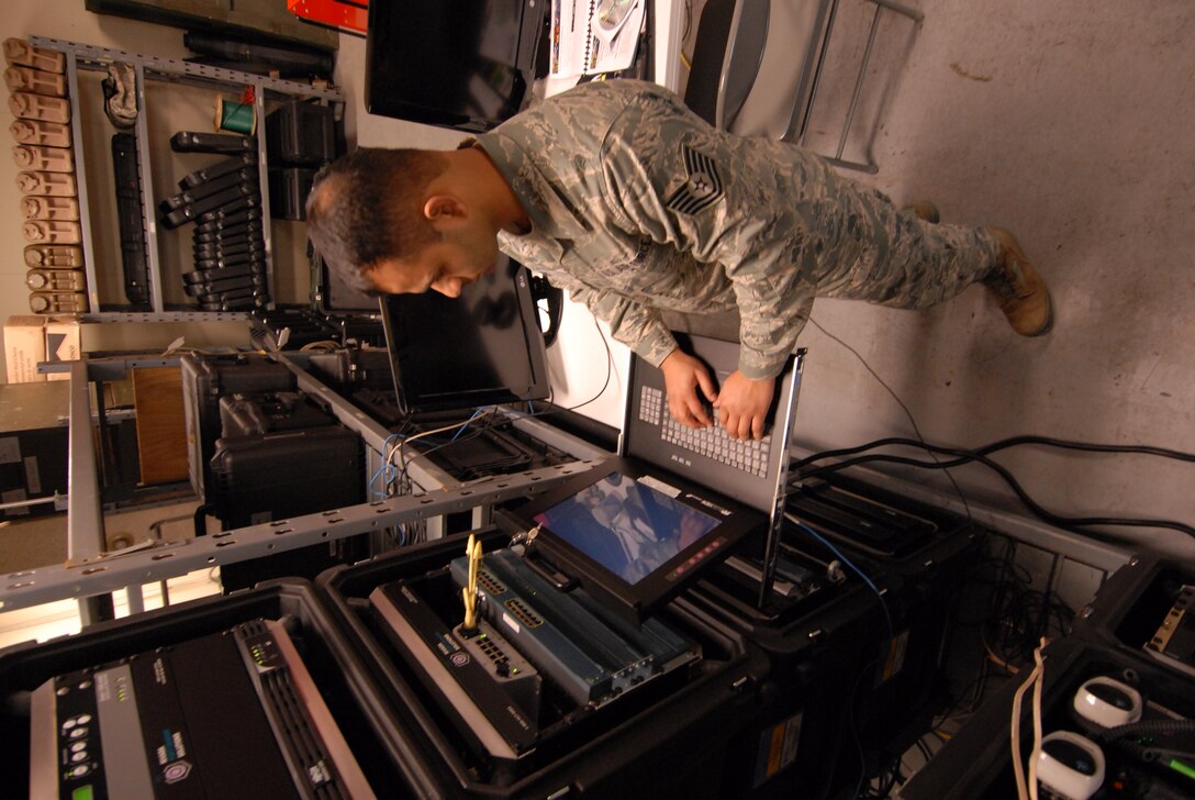 Tech. Sgt. Mohommad Ali 914th Communications cyber transport operations technician performs a software check on the Joint Incident Site Communications Capability systems in the 914th Communications Squadron November 7, 2010 at the Niagara Falls Air Reserve Station, N.Y. (U.S. Air Force Photo by Senior Airman Andrew Caya 914th Airlift Wing Public Affairs)