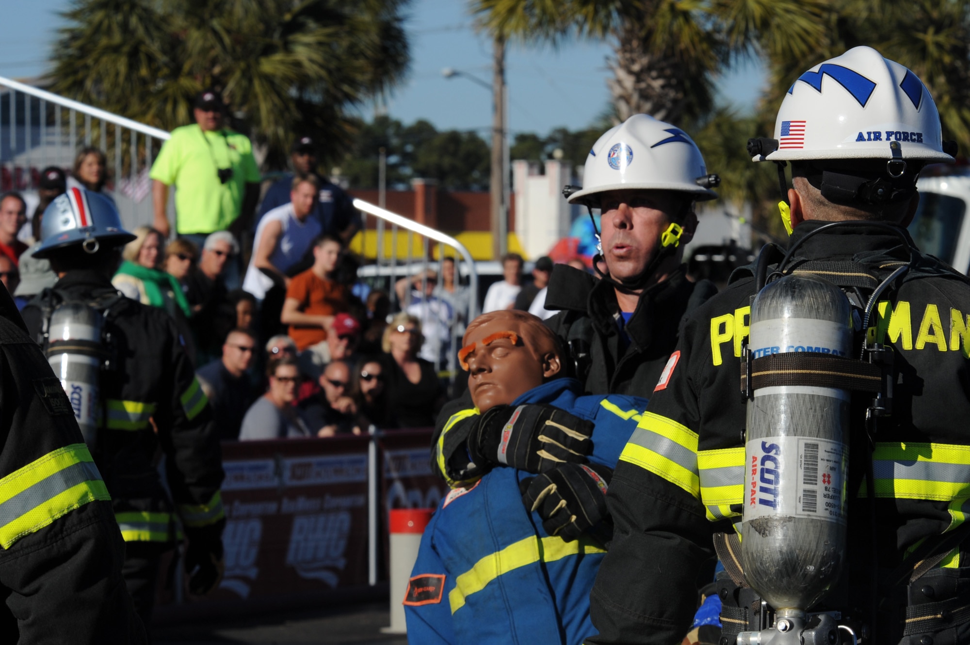 Ken Helgerson "rescues" a life sized 175-pound "victim" as he competes in the team relay event at Myrtle Beach, S.C., on Nov. 13, 2010. Mr. Helgerson is a firefighter at the Air Force Academy in Colorado Springs, Colo. (U.S. Air Force photo/Staff Sgt. Desiree N. Palacios)