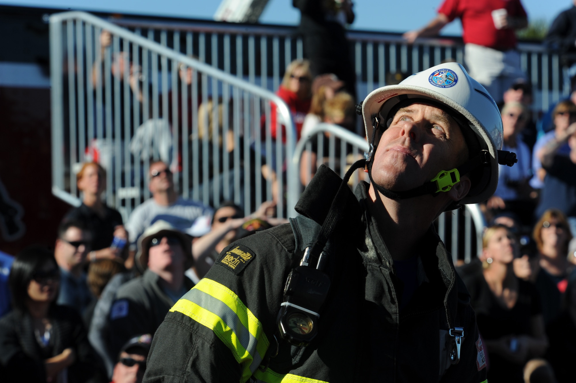 Ken Helgerson waits for his teammate to pass the baton as he competes in the team relay event at Myrtle Beach, S.C., on Nov. 13, 2010. Mr. Helgerson is a firefighter at the Air Force Academy in Colorado Springs, Colo. (U.S. Air Force photo/Staff Sgt. Desiree N. Palacios)