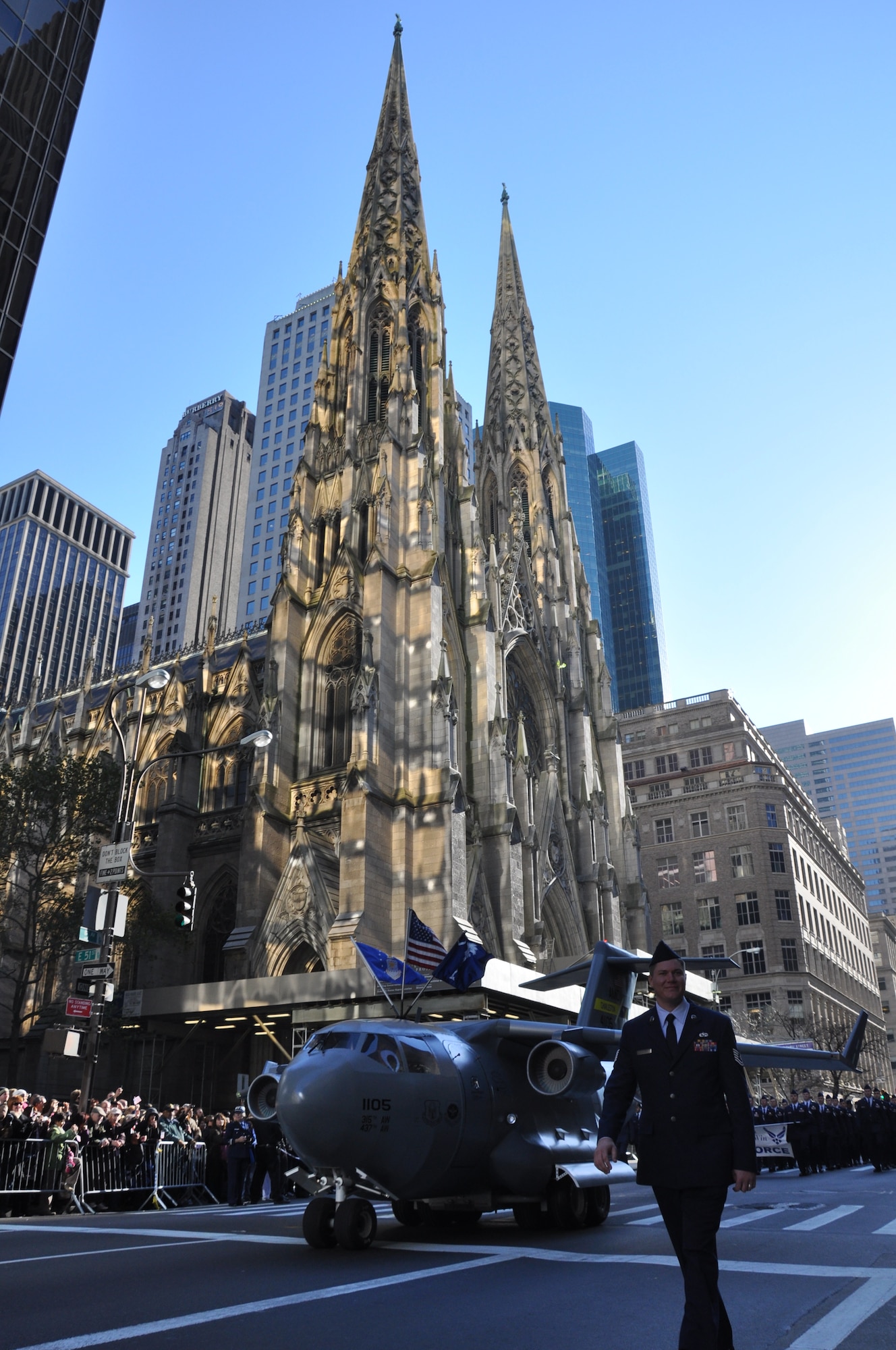 The 315th Airlift Wing's mini C-17 replica drives past St Patrick’s Cathedral in New York City during the annual Veterans Day Parade Nov 12. The mini C-17 is a community relations tool built and maintained by Reservists from the 315th AW Charleston AFB, S.C. (U.S. Air Force photo/1Lt Joe Simms)