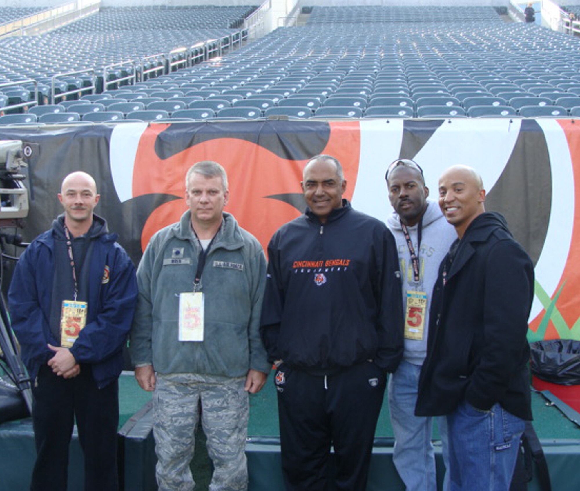 WRIGHT-PATTERSON AIR FORCE BASE, Ohio –Tech. Sgt. Shawn McKellop, 445th Logistics Readiness Squadron, Lt. Col. Donald Wren, 445th LRS commander, Cincinnati Bengals coach Marvin Lewis, Master Sgt Mark Lyle, Superintendent, 88th Forces Support Squadron, Honor Guard, and Tech. Sgt. Eddy Wells, 88th Forces Support Squadron, Honor Guard, enjoy the pre-game activities during the Oct. 31 Cincinnati Bengals versus Miami Dolphins football game in Cincinnati.  The Honor Guard performed during the game that afternoon. (Courtesy photo)