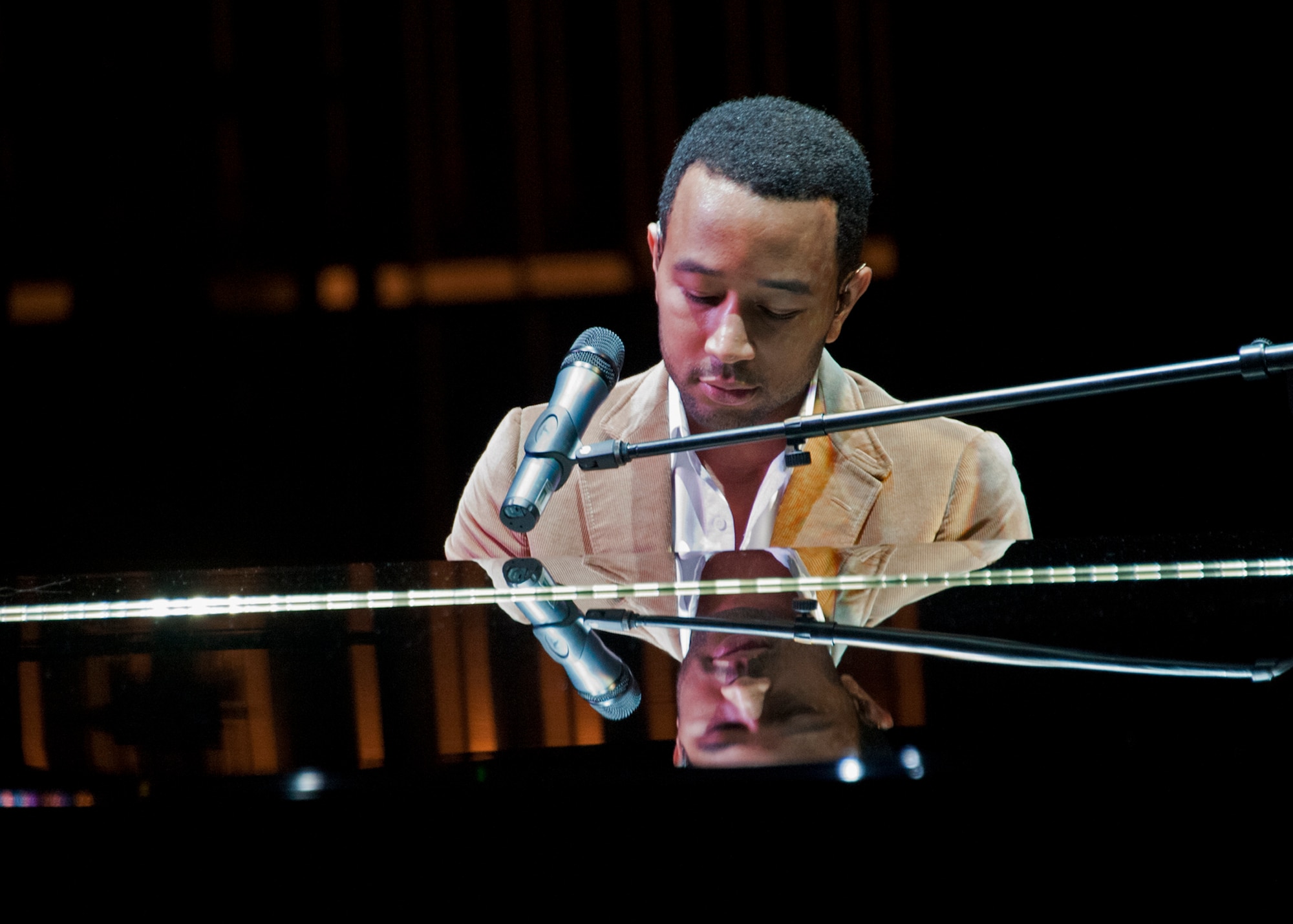 Six-time Grammy winning R & B star John Legend entertained a crowd of more than 1,000 at the Mattie Kelly Performing Arts Center in Niceville, Fla., Nov. 13.  The show was part of the Air Force Reserve's “Stateside Tour for the Troops” series of concerts and special events.  Military and family members from Eglin Air Force Base, Hurlburt and Duke Field were given ticketed invitations to spend an “Evening with John Legend.”  Tour for the Troops is tied to the Reserve's Get One Now program and Reservists who refer a friend to the Air Force Reserve through Get One Now can receive free tickets to concerts and events, with VIP exclusives, like backstage photos or a meet and greet with the starts.  (U.S. Air Force photo/ Tech. Sgt. Samuel King Jr.)