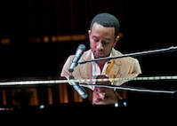 Six-time Grammy winning R & B star John Legend entertained a crowd of more than 1,000 at the Mattie Kelly Performing Arts Center in Niceville, Fla., Nov. 13.  The show was part of the Air Force Reserve's “Stateside Tour for the Troops” series of concerts and special events.  Military and family members from Eglin Air Force Base, Hurlburt and Duke Field were given ticketed invitations to spend an “Evening with John Legend.”  Tour for the Troops is tied to the Reserve's Get One Now program and Reservists who refer a friend to the Air Force Reserve through Get One Now can receive free tickets to concerts and events, with VIP exclusives, like backstage photos or a meet and greet with the starts.  (U.S. Air Force photo/ Tech. Sgt. Samuel King Jr.)