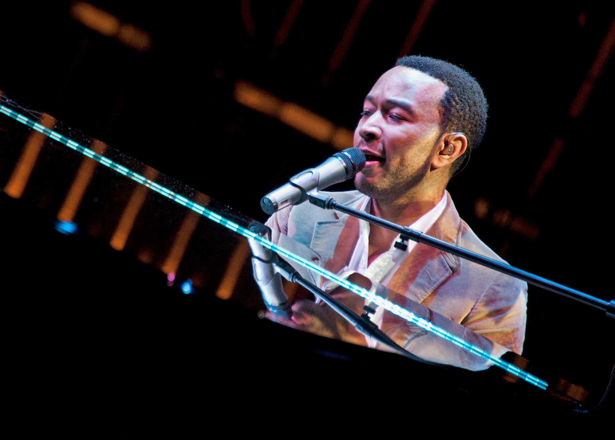 Six-time Grammy winning R & B star John Legend entertained a crowd of more than 1,000 at the Mattie Kelly Performing Arts Center in Niceville, Fla., Nov. 13.  The show was part of the Air Force Reserve's “Stateside Tour for the Troops” series of concerts and special events.  Military and family members from Eglin Air Force Base, Hurlburt and Duke Field were given ticketed invitations to spend an “Evening with John Legend.”  Tour for the Troops is tied to the Reserve's Get One Now program and Reservists who refer a friend to the Air Force Reserve through Get One Now can receive free tickets to concerts and events, with VIP exclusives, like backstage photos or a meet and greet with the starts.  (U.S. Air Force photo/ Tech. Sgt. Samuel King Jr.)