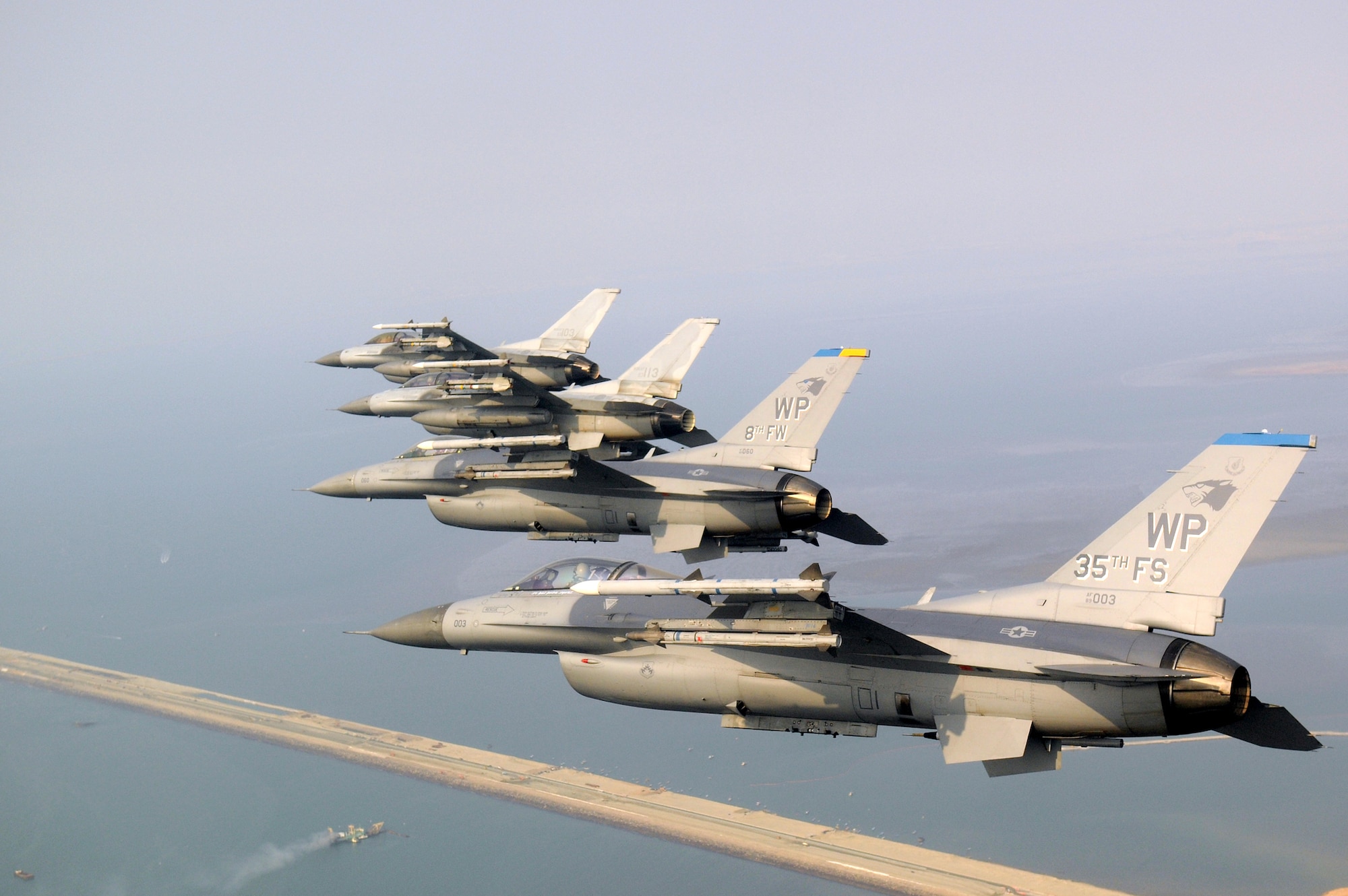 Four F-16 Fighting Falcons fly during a U.S. and South Korean air force coalition flight Nov. 10, 2010, over the Saemangeum Seawall during a U.S. and South Korean air force coalition flight in celebration of the 60th anniversary of the Korean War. (U.S. Air Force photo/Master Sgt. Jason Wilkerson)