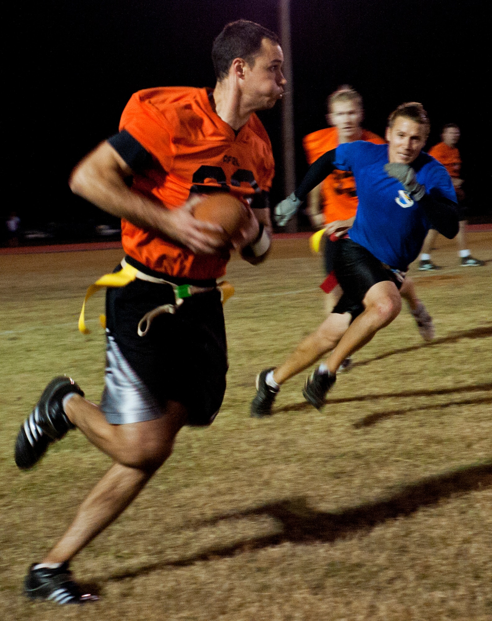 Tim Ager, Air Force Research Lab, sprints down field during the base intramural championship game, Nov. 10.  AFRL defeated the 53rd (14-12) in the second of two games to win back-to-back base titles.  The 53rd team gave AFRL its only loss of the season, (20-19) earlier in the evening, forcing a winner-take-all game in the double-elimination tournament.  (U.S. Air Force photo/ Samuel King Jr.)