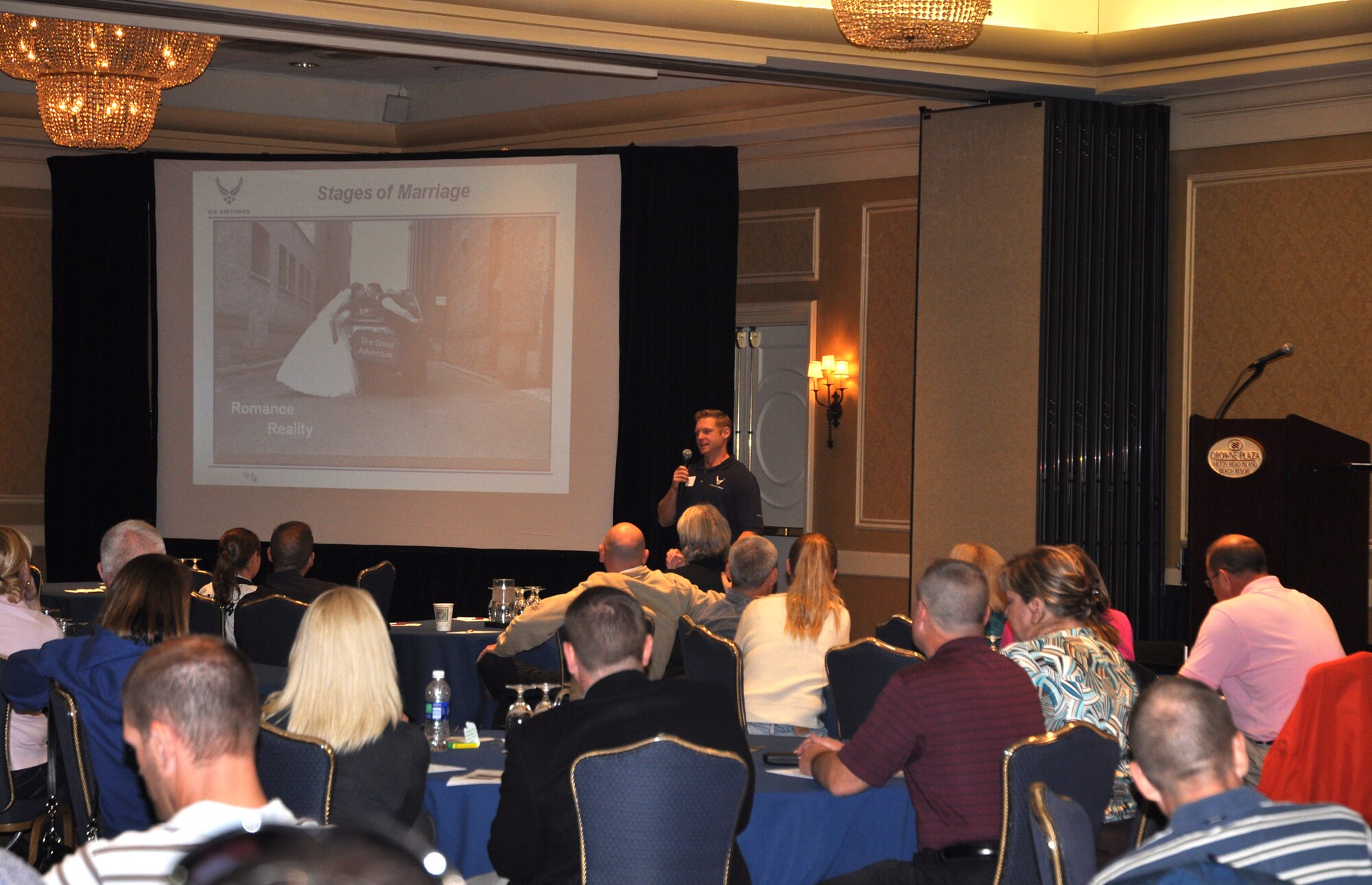 Participants from the 315 AW, Joint Base Charleston, S.C. and 439 AW from Westover Air Reserve Base, Mass., listen to Chaplain (Capt.) Matthew Simpson, a chaplain with the 315 AW, discuss the stages of marriage as part of resiliency within relationships at the Yellow Ribbon Program event Nov. 12-14, 2010 at Hilton Head, S.C.  (U.S. Air Force photo/Airman 1st Class Robert Pilch)