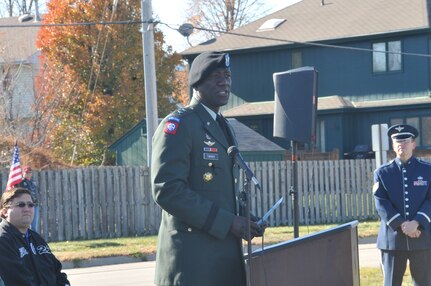 Maj. Gen. Abraham J. Turner, Chief of Staff, U.S. Strategic Command, speaks during a street re-naming ceremony held Nov 15 in honor of 1st Lieutenant Mark Noziska, who was killed Aug 30, 2010 by a roadside bomb while serving in Afghanistan. Four blocks of Polk Street in Papillion, Neb., were re-named in memory of Lt Noziska, who served as a platoon leader in the 22nd Infantry Regiment, U.S. Army. Lt Noziska lived on Polk St during his high school years.