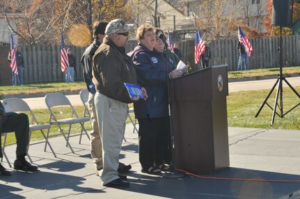 Parents and family of 1st Lieutenant Mark Noziska speak on behalf of their son, who was killed Aug 30, 2010 by a roadside bomb while serving in Afghanistan, during a street renaming ceremony held Nov 15. Four blocks of Polk Street in Papillion, Neb., were re-named in memory of Lt Noziska, who served as a platoon leader in the 22nd Infantry Regiment, U.S. Army.