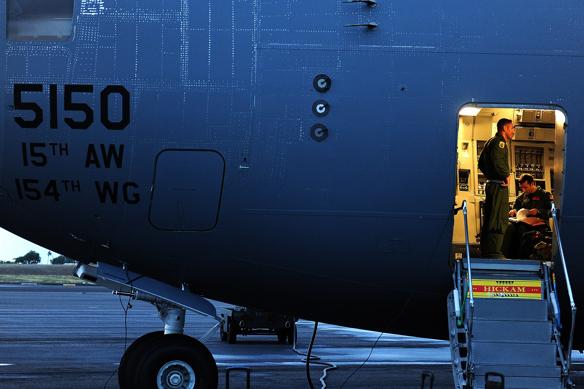535th Airlift Squadron aircrew run through pre-flight checklists prior to an airdrop mission and multiday training exercises Nov. 12. The 535th AS aircrew trained in unrestricted descent assault landings, air drop, combat offloads, air refueling, night vision goggle training, combat offloads, low levels, mountainous terrain, assault landings, threat responses and multiple ship formation training during a five day training trip to Washington Nov 12-17. (U.S. Air Force photo/Staff Sgt. Mike Meares)