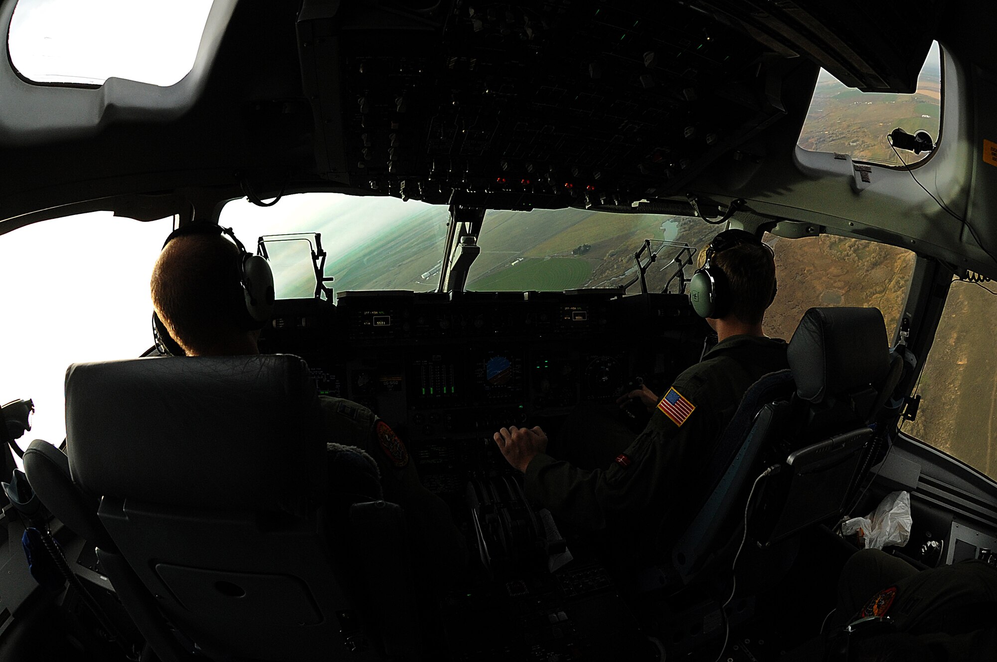 The 535th Airlift Squadron aircrew trained in unrestricted descent assault landings, air drop, combat offloads, air refueling, night vision goggle training, combat offloads, low levels, mountainous terrain, assault landings, threat responses and multiple ship formation training during a five day training trip to Washington Nov 12-17. (U.S. Air Force photo/Staff Sgt. Mike Meares)