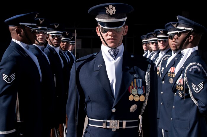 NELLIS AIR FORCE BASE, Nev.-- Capt. Chad Frey, U.S. Air Force Honor Guard Drill Team, flight commander from Bolling Air Force Base, Washington D.C. completes his walk through the gauntlet during a performance on the Nellis flightline Nov. 13. The performance was  part of the 2010 Aviation Nation Nellis Open House.  (U.S. Air Force photo by Tech. Sgt. Michael R. Holzworth)(Released)