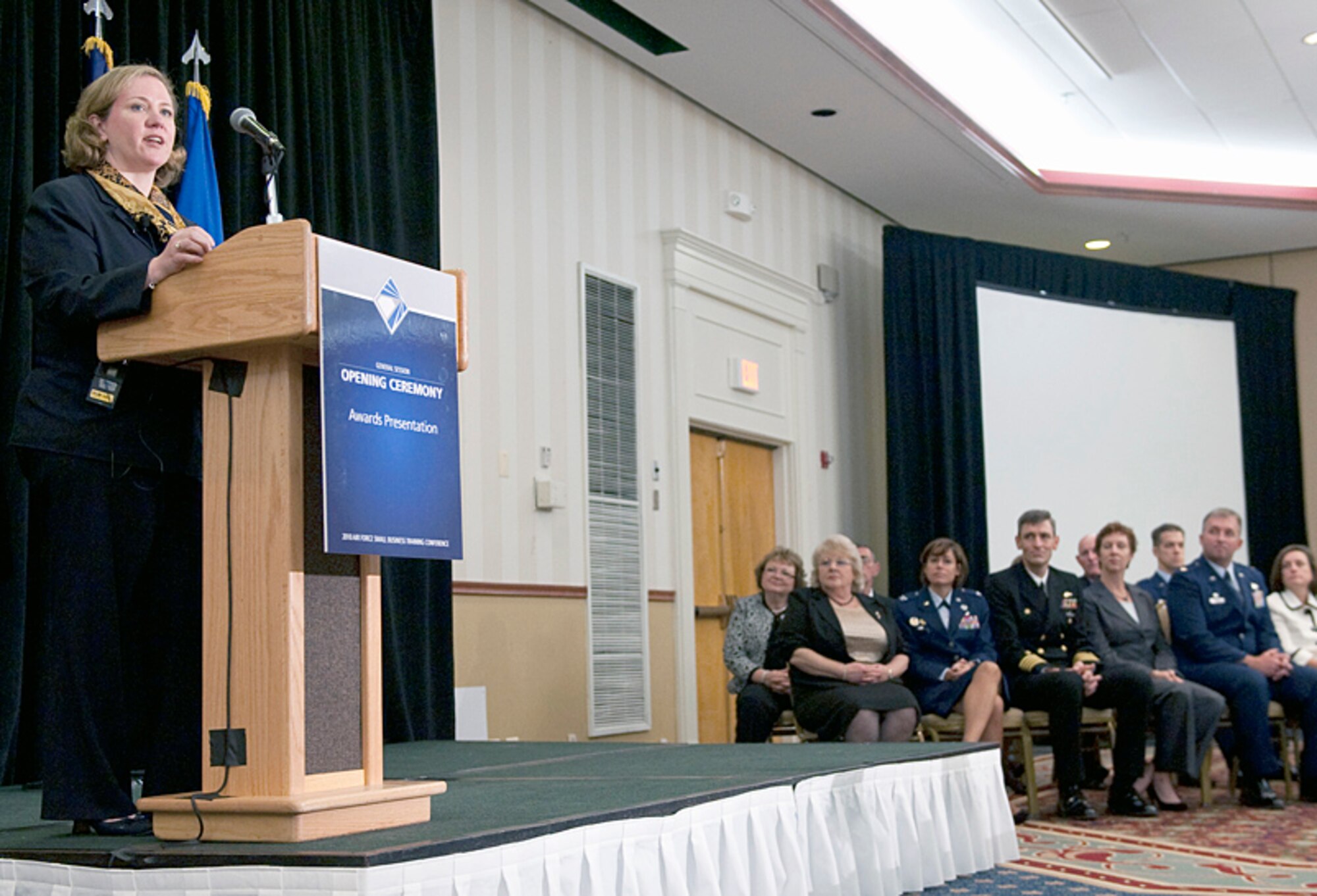 Undersecretary of the Air Force Erin C. Conaton presents awards during the Air Force Small Business Fall Training Conference Nov. 15, 2010, in Arlington, Va. (U.S. Air Force photo/Jim Varhegyi)