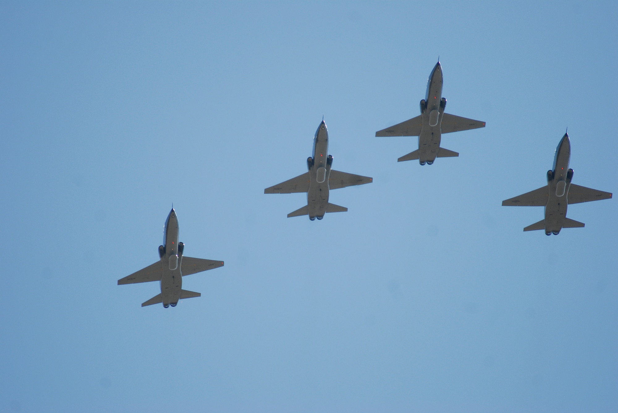 Four T-38 Talons, from the 47th Flying Training Wing, fly over San Angelo Stadium before the start of the Angelo State vs. Central Oklahoma football game Nov. 13.  The flyover was part of the universities military appreciation activities honoring all active duty and retired military personnel and their families. (U.S. Air Force photo/Master Sgt. Randy Mallard)