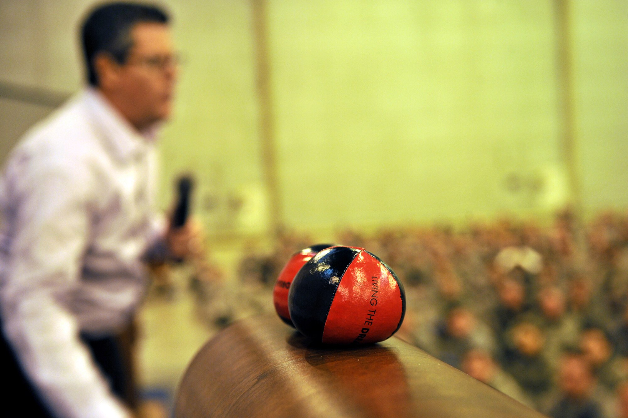 OFFUTT AIR FORCE BASE, Neb. -- Motivational speaker Curtis Zimmerman encourages the crowd during a 55th Wing Wingman Day 2010 commander's call Nov. 12 in the Bennie Davis Maintenance Facility's Dock One.  Airmen in the 55th WG took part in various events and briefings during the day to promote teamwork and educate Airmen on topics such as suicide prevention and the dangers of drinking and driving. U.S. Air Force photo by Charles Haymond