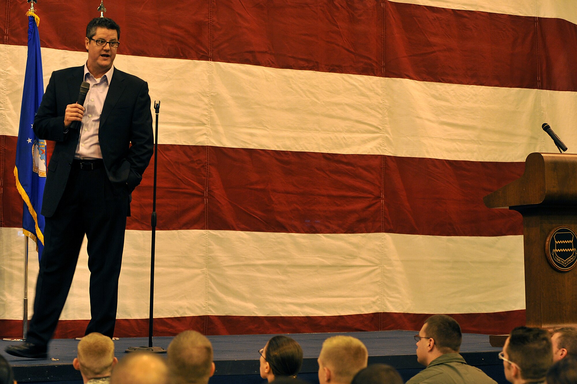 OFFUTT AIR FORCE BASE, Neb. -- Motivational speaker Curtis Zimmerman encourages the crowd during a 55th Wing Wingman Day commander's call Nov. 12 in the Bennie Davis Maintenance Facility's Dock One.  Airmen in the 55th Wing took part in various events and briefings during the day to promote teamwork and educate Airmen on topics such as suicide prevention and the dangers of drinking and driving. 
U.S. Air Force photo by Charles Haymond