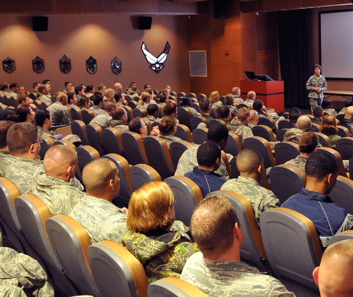 OFFUTT AIR FORCE BASE, Neb. - Lt. Col Dana McCown, 55th Maintenance Squadron commander, speaks to a room full of 55th Wing Airmen Nov. 12 about the devasting effects a drunk driver has had in her life. Both of her parents were killed when a drunk driver ran into their vehicle a few years ago. The presentation was one of several events and briefings during Wingman Day 2010 to promote teamwork and educate Airmen on such things as suicide prevention and the dangers of drinking and driving. U.S. Air Force photo by Jeff W. Gates. 