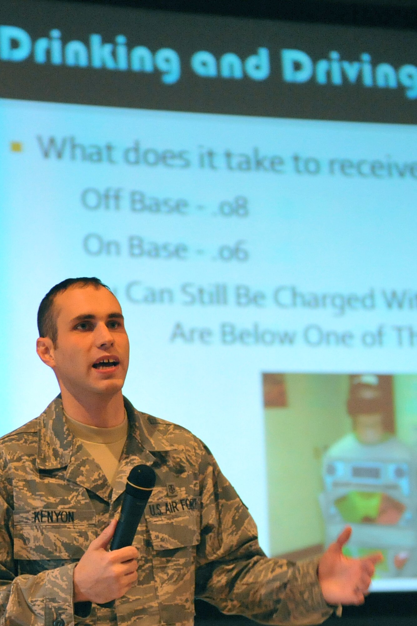OFFUTT AIR FORCE BASE, Neb. - Staff Sgt. Shawn Kenyon, a member of the 55th Medical Operations Squadron, speaks to Airmen in the base theater about the dangers of drinking and driving during Wingman Day 2010 Nov. 12. Throughout the day, various group activities and briefings were held to promote teamwork and educate Airmen on things like suicide prevention and the dangers of drinking and driving. U.S. Air Force photo by Jeff W. Gates. 