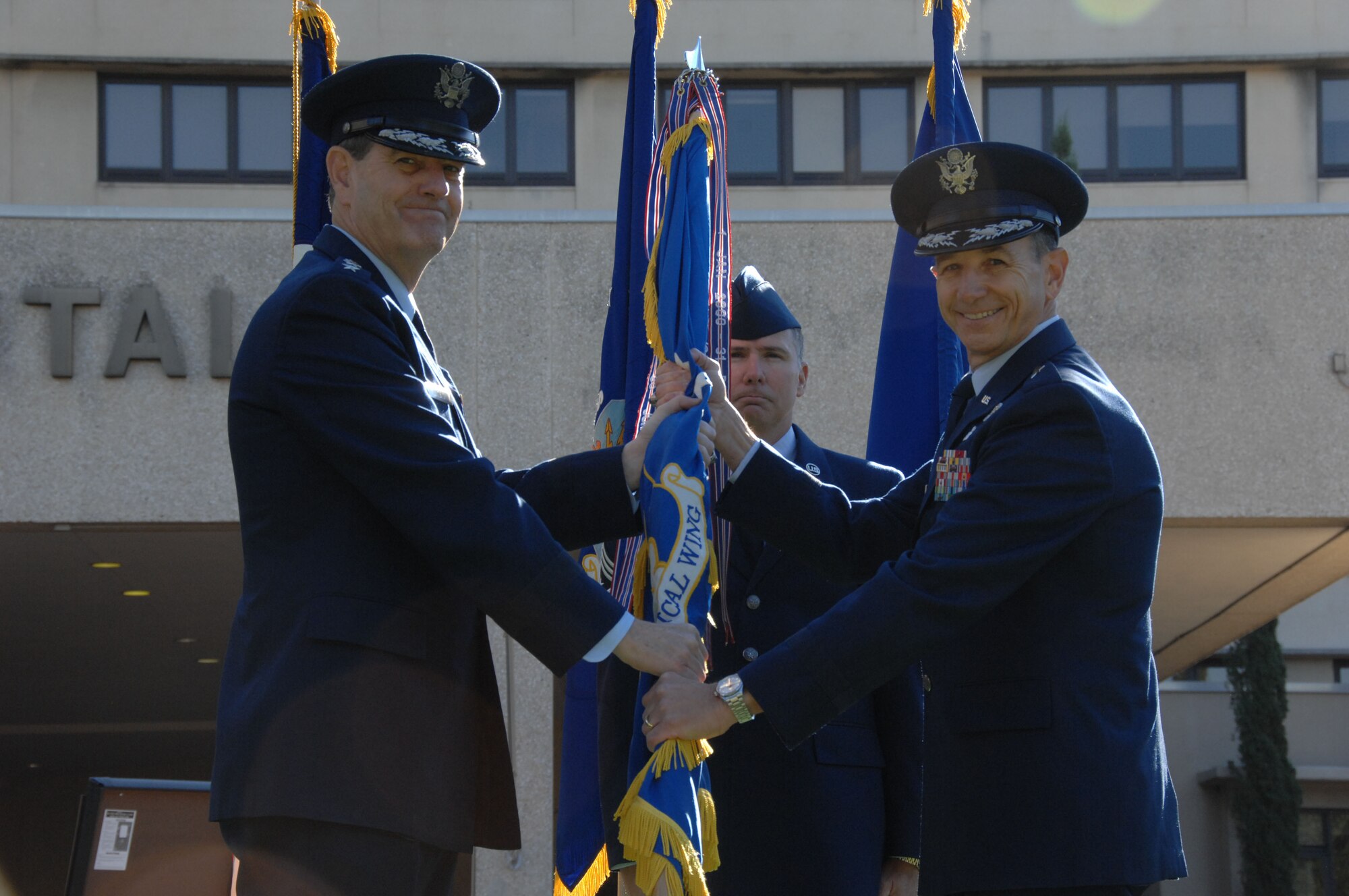 Gen. Stephen R. Lorenz, Air Education and Training Command Commander (Left), presents the unit guidon to Brig. Gen. Select Byron Hepburn (Right), officially declaring him commander of the 59th Medical Wing, San Antonio, Texas on Nov. 16, 2010. General Hepburn was previously assigned as Deputy Surgeon General at Headquarters, U.S. Air Force, Bolling Air Force Base, D.C.  (U.S. Air Force photo by Staff Sgt. Robert Barnett/Released)