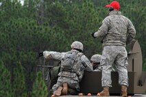 Members of the 28th Security Forces Squadron from Ellsworth Air Force Base, S.D., participate in the M240 competition during Global Strike Challenge at Fort Polk, La., Nov 14. The competition includes security forces along with missile and bomber forces from Air Force Global Strike Command. Teams have the opportunity to participate in innovative thinking, teamwork and esprit de corps. (U.S. Air Force photo/Senior Airman Brittany Y. Bateman)
