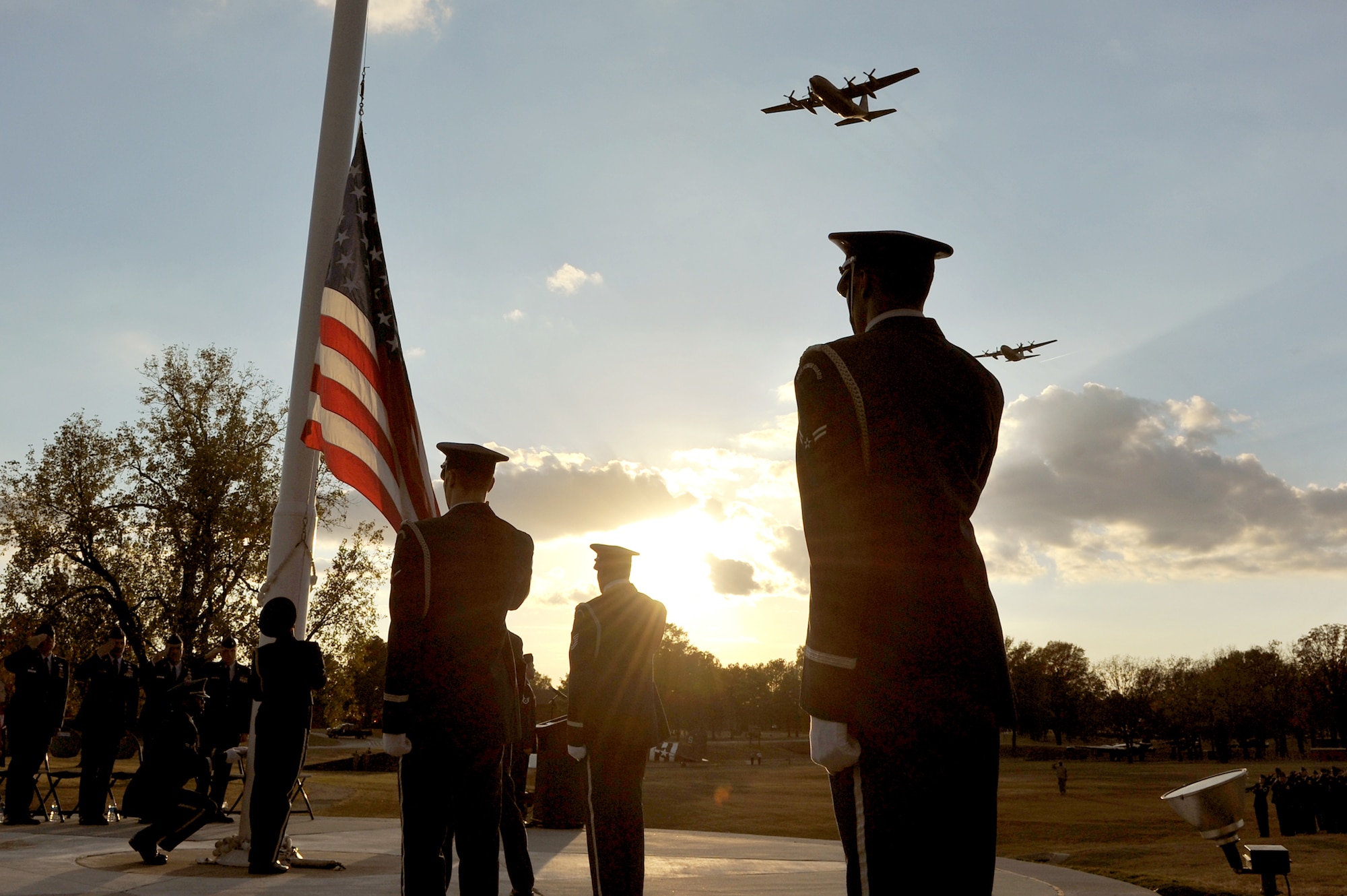 A C-130 Hercules flies over the Veterans Day retreat ceremony Nov. 10, 2010, at Little Rock Air Force Base, Ark.  (U.S. Air Force photo/Staff Sgt. Chris Willis)