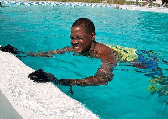 Tech. Sgt. Clarence May, 96th Aerospace Medicine Squadron, performs kicks under water during the pilot deep water running class in October. Classes will be open to all military beginning Nov. 22. (U.S. Air Force photo/ Samuel King Jr.)