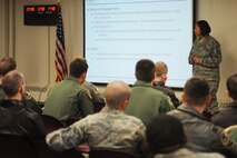 MINOT AIR FORCE BASE, N.D. – Tech. Sgt. Dana Cummins, 5th Bomb Wing staff judge advocate office superintendent, provides a pre-deployment briefing to the 69th Bomb Squadron here Nov. 12. Lt. Col. Michael Cardoza, 69th Bomb Squadron commander, and the Nighthawks are scheduled to deploy to Andersen AFB, Guam, in support of U.S. Pacific Command’s Continuous Bomber Presence, a first for the unit since the Vietnam War. (U.S. Air Force photo/Airman 1st Class Aaron-Forrest Wainwright)
