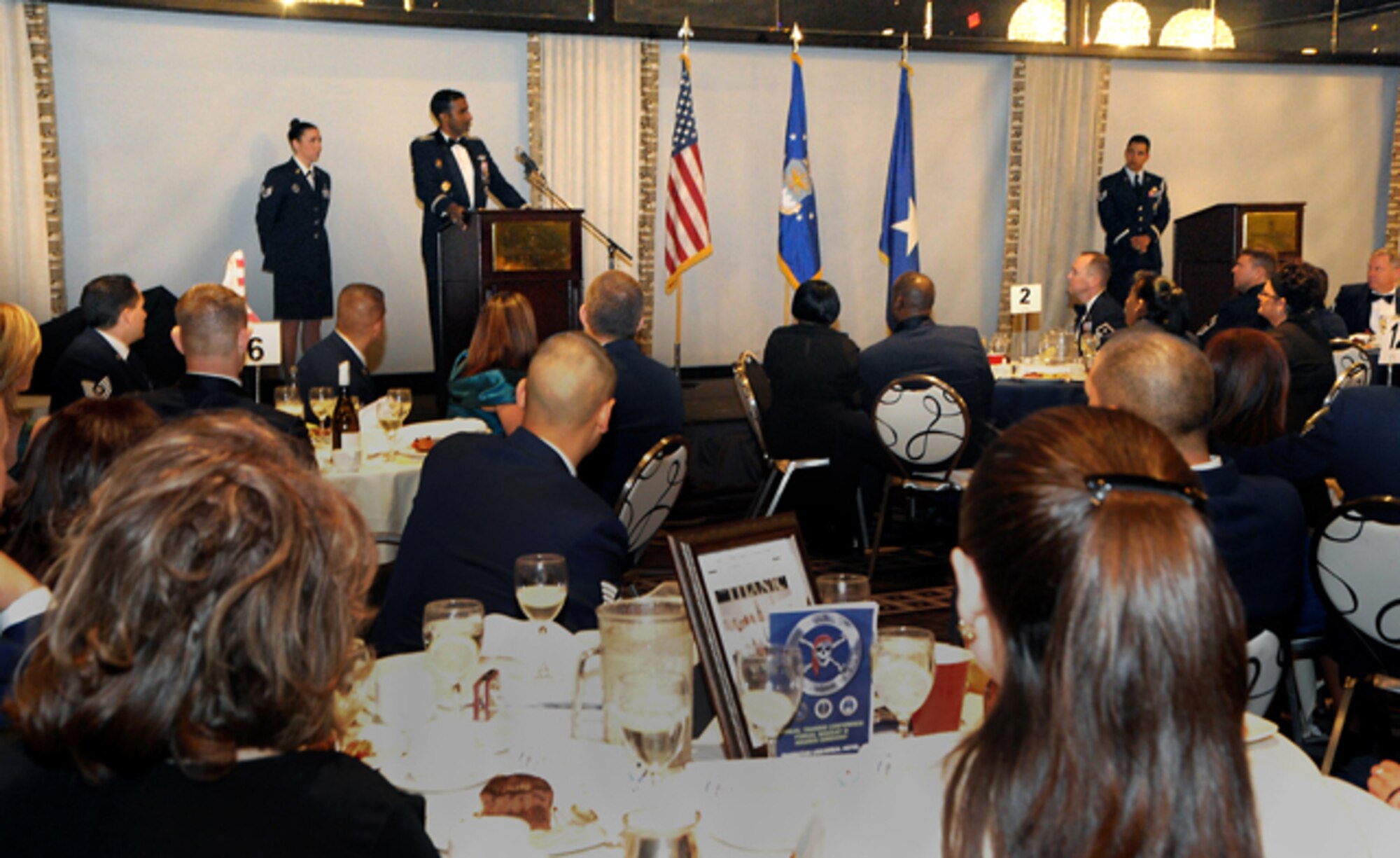 Brig. Gen. Balan R. Ayyar, commander of Air Force Recruiting Service, speaks to members and spouses of the 369th Recruiting Squadron during their annual awards banquet. Each year, every recruiting squadron honors their top-achieving recruiters. (U.S. Air Force photo)

