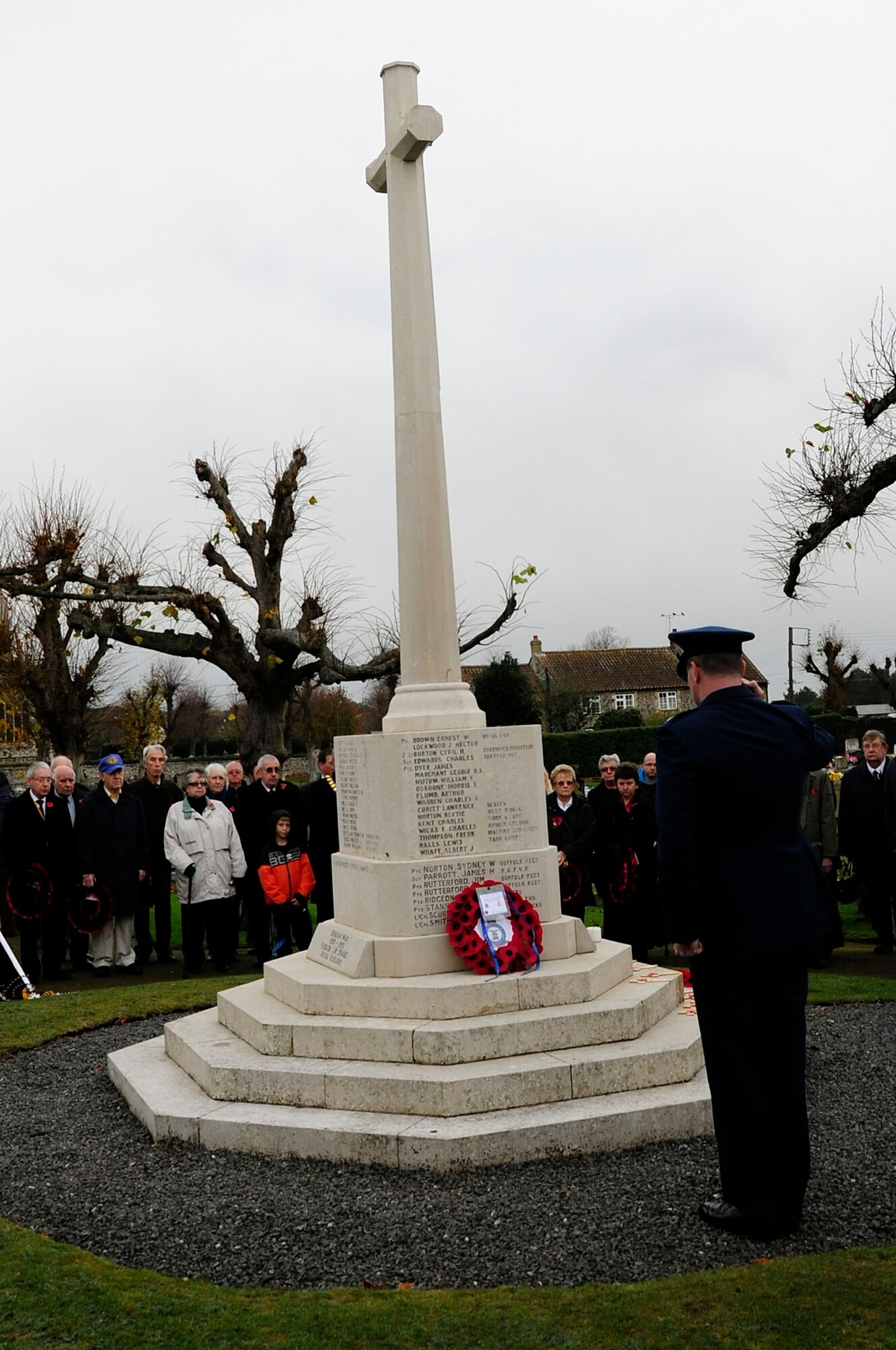 BRANDON, England – Col. Daniel Orcutt, 48th Operations Group commander, salutes after placing a wreath of red poppies on the Brandon War Memorial during a Remembrance Sunday ceremony Nov. 14.  The poppy flower is a traditional symbol of remembrance of World War I. It was in bloom across some of the worst battlefields in the war. (U.S. Air Force photo/Senior Airman Stephen Linch)