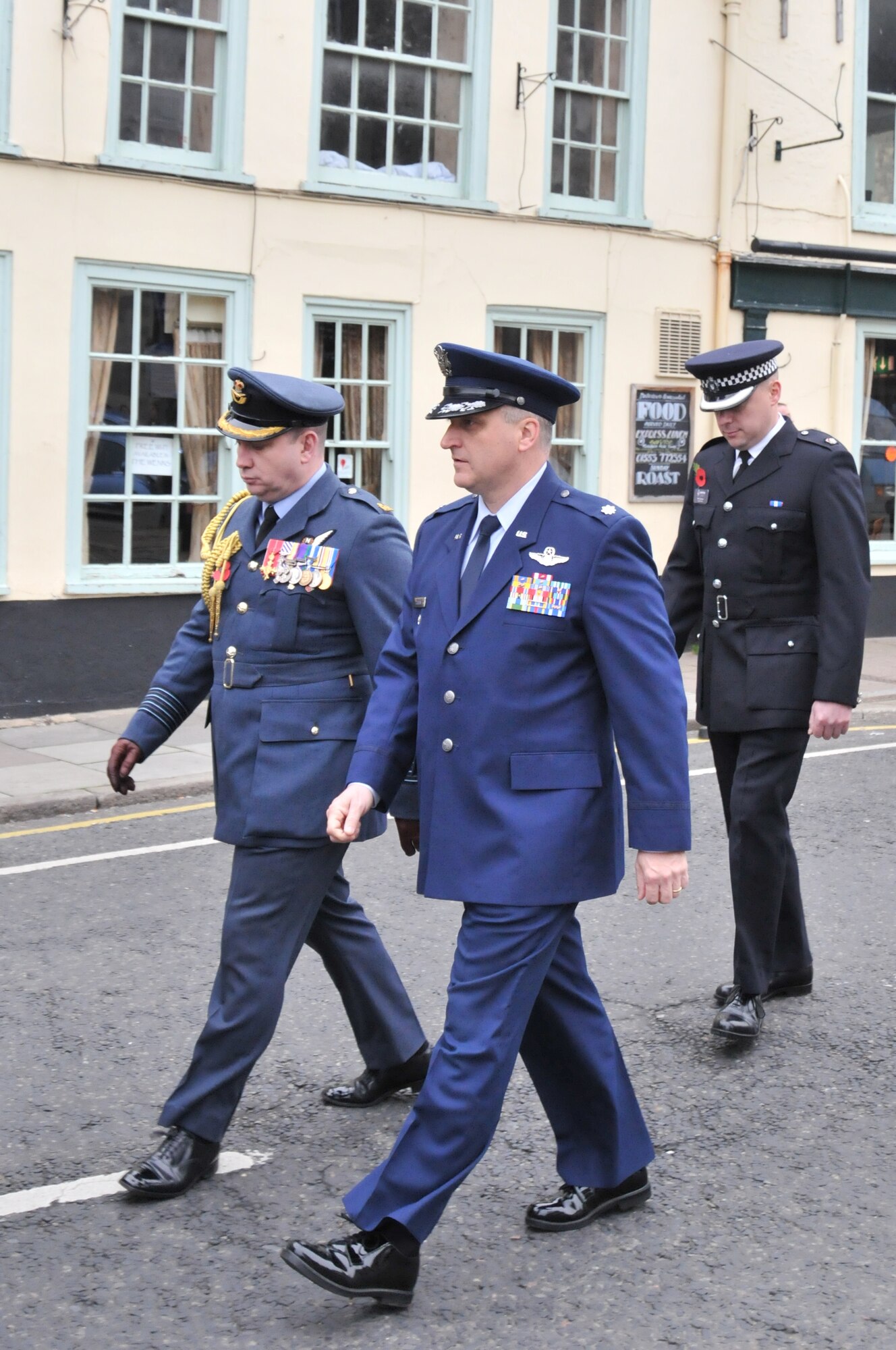 KINGS LYNN, England – Lt. Col. Joseph Coogan , 48th Operations Group deputy commander, speaks with Royal Air Force Group Captain Rocky Rochelle, commander at RAF Marham, during a Remembrance Sunday procession Nov. 14.  Colonel Coogan placed a wreath at the Kings Lynn War Memorial. (U.S. Air Force photo/Senior Airman David Dobrydney) 
