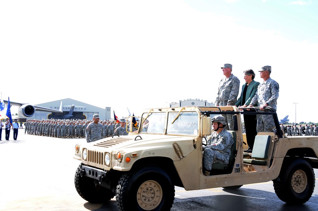 Gen. Craig T. McKinley, National Guard Bureau chief, Hawaii Gov. Linda Lingle, and Maj. Gen. Robert G. F. Lee, Hawaii Adjutant General make their way to review the troops of the Hawaii Army and Air National Guard during Maj. Gen. Lee's farewell ceremony on Joint Base Pearl Harbor-Hickam, Nov 6. Gov. Lingle and Maj. Gen. Lee performed their last review of the troops in the Hawaii Air and Army National Guard . Both Gov. Lingle and Maj. Gen. Lee will leave office after eight years of leading the state of Hawaii. (U.S. Air Force photo/Tech. Sgt. Betty J. Squatrito-Martin)