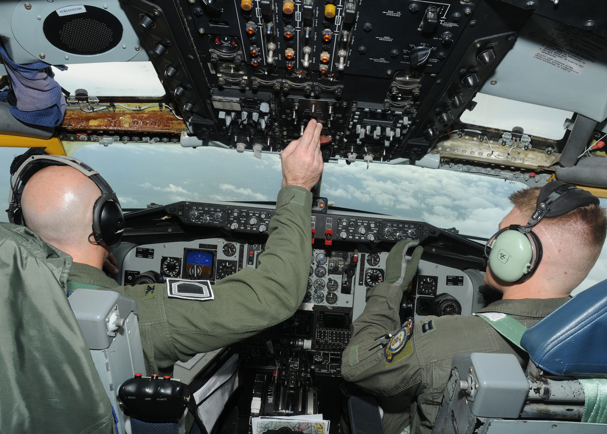 RAF MILDENHALL, England-- Col. Chad Manske (left), 100th Air Refueling Wing commander, and his co-pilot Capt. Kurt Wampole, 100th Operations Group, fly a KC-135 Stratotanker during a refueling training mission over Germany Nov. 12, 2010.  This mission with the Heavy Airlift Wing, Papa Air Base, Hungary, allowed both wings to received vital training they don't get the opportunity to do on a regular basis.  (U.S. Air Force photo/Senior Airman Tabitha M. Lee)