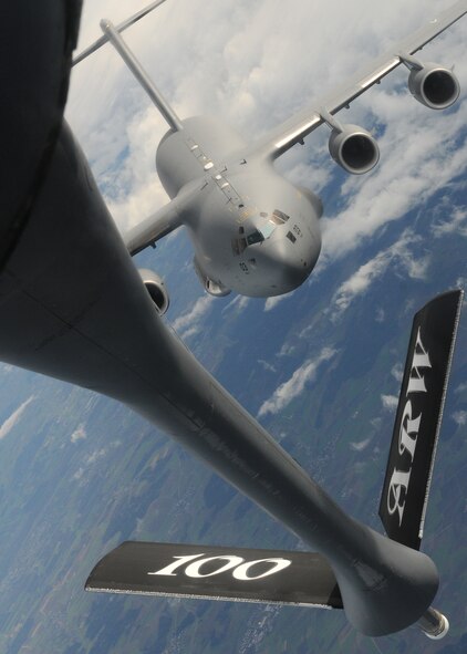 RAF MILDENHALL, England-- A C-17 Globemaster III from the Heavy Airlift Wing, Papa Air Base, Hungary, approaches a 100th Air Refueling Wing KC-135 Stratotanker boom over Germany Nov. 12, 2010.  During the training mission, both units received vital training they don't get the opportunity to do on a regular basis.  (U.S. Air Force photo/Senior Airman Tabitha M. Lee)