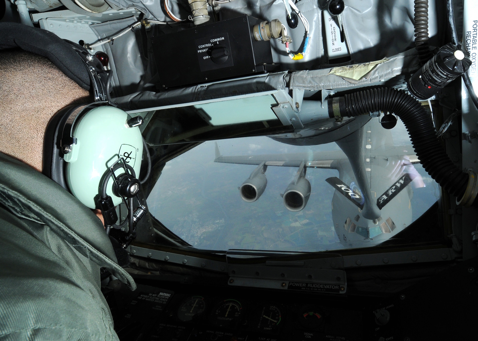 RAF MILDENHALL, England -- Airman 1st Class Ronnie Echavarria, 351st Air Refueling Squadron boom operator, flies the boom of a KC-135 Stratotanker toward a C-17 Globemaster III from the Heavy Airlift Wing, Papa Air Base, Hungary, over Germany Nov. 12, 2010.  Training missions like this allow boom operators to get training with a heavy aircraft that they don't normally receive here.  (U.S. Air Force photo/Senior Airman Tabitha M. Lee)