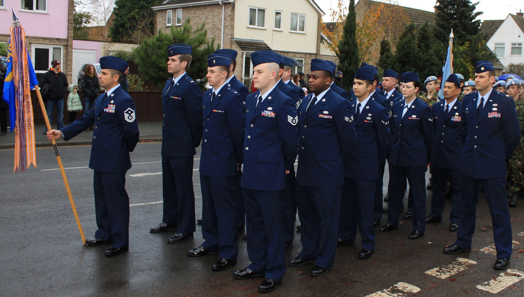 SOHAM, England -- Volunteers from the 100th Logistics Readiness Squadron stand in formation prior to the Remembrance Day Parade in nearby Soham Nov. 14. The 100th LRS is linked to this local community through their honorary commander, Hamish Ross. (Courtesy photo/Wendy Bell)