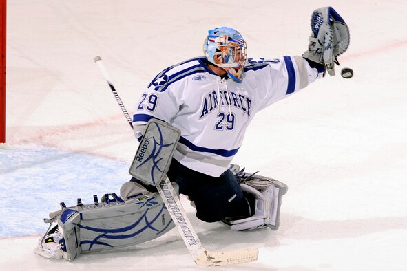 Air Force goalie Jason Torf blocks a shot on goal during the Falcons' match against No. 3 Yale at the Cadet Ice Arena Nov. 14, 2010. Torf, a native of Hermosa Beach, Calif., was named an Atlantic Hockey Association rookie of the week after making 34 saves in the Falcons' 4-3 victory. (U.S. Air Force photo/Mike Kaplan)