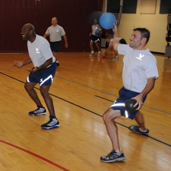 LAUGHLIN AIR FORCE BASE, Texas – Master Sgt. Kevin Holmes, 47th Mission Support Group first sergeant, and Master Sgt. Jeffrey Stockwell, 47th Operations Group first sergeant, compete in a game of dodgeball with other members of Laughlin’s Top 3 organization against members of the Rising 6 Club at Losano Fitness Center here Nov. 10. The Top 3 is made up of Laughlin’s senior NCO’s and the Rising 6 consists of all other enlisted ranks. (U.S. Air Force photo by Airman 1st Class Blake Mize)