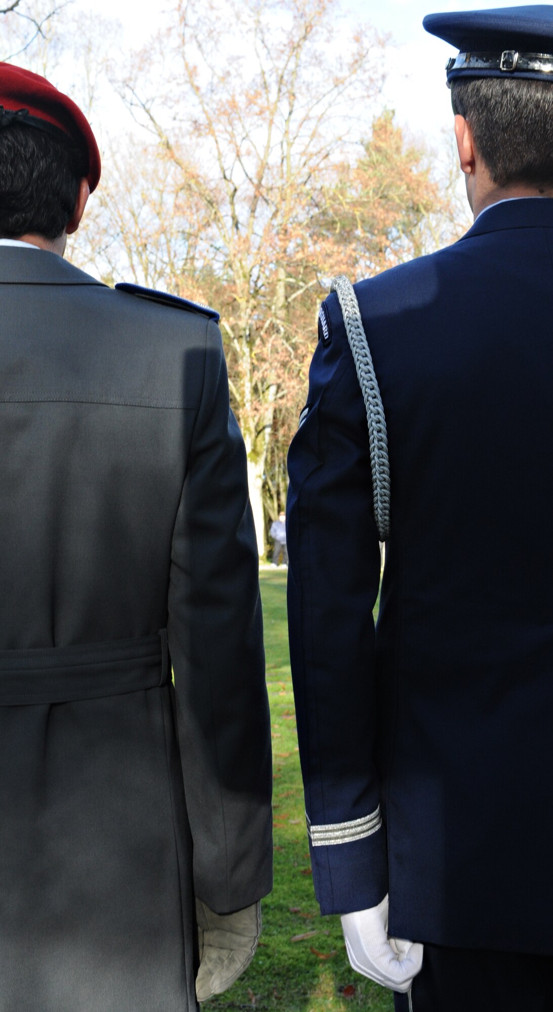 BITBURG, Germany – A German Soldier and U.S. Air Force honorguardsman stand side-by-side during a Volkstrauertag, the German National Day of Mourning, ceremony Nov. 11. German and American servicemembers as well as firefighters, police and government officials from the local area participated in the ceremony to remember victims of war and tyranny. (U.S. Air Force photo/Staff Sgt. Benjamin Wilson)