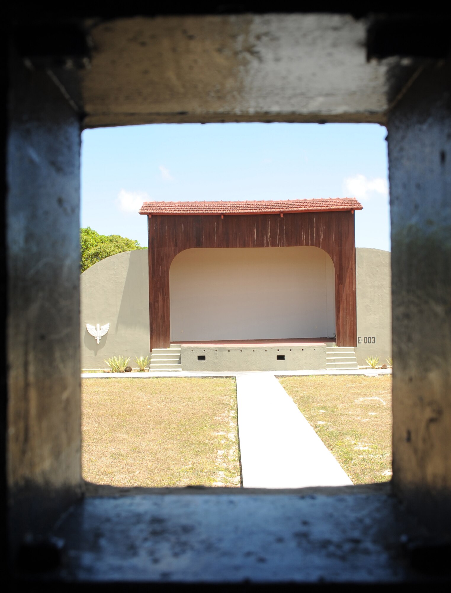 Looking out from the recently restored outdoor projection room at Natal Air Base, Brazil is the base’s outdoor theater. The theater was used to showcase USO tours and to show movies to troops stationed and transiting through Natal Air Base during World War II. The base was nicknamed "Trampoline to Victory" during World War II because it was used as a “jumping off” point for U.S. aircraft before entering African and European theaters. The base is located on the eastern most point of South America. American servicemembers are once again stationed on the base as they participate in CRUZEX V. CRUZEX V, or Cruzeiro Do Sul (Southern Cross), is a multi-national combined exercise involving the Air Forces of Argentina, Brazil, Chile, France and Uruguay, and observers from numerous other countries with more than 82 aircraft and almost 3,000 Airmen involved. (U.S. Air Force photo/Staff Sgt. Michael Matkin)