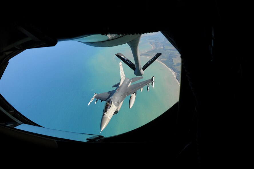 A U.S. Air Force F-16 Fighting Falcon from the 140th Fighter Wing, Buckley, Colo., detaches from a KC-135 Stratotanker from the 161st Air Refueling Wing, Phoenix, Ariz., after refueling over Brazil in support of CRUZEX, November 12, 2010,. Both wings are participating CRUZEX V, or Cruzeiro Do Sul (Southern Cross).  CRUZEX is a multi-national combined exercise involving the Air Forces of Argentina, Brazil, Chile, France and Uruguay, and observers from numerous other countries with more than 82 aircraft and almost 3,000 Airmen involved.  U.S. Air Force Photo by Master Sgt. Kelly M. Deitloff