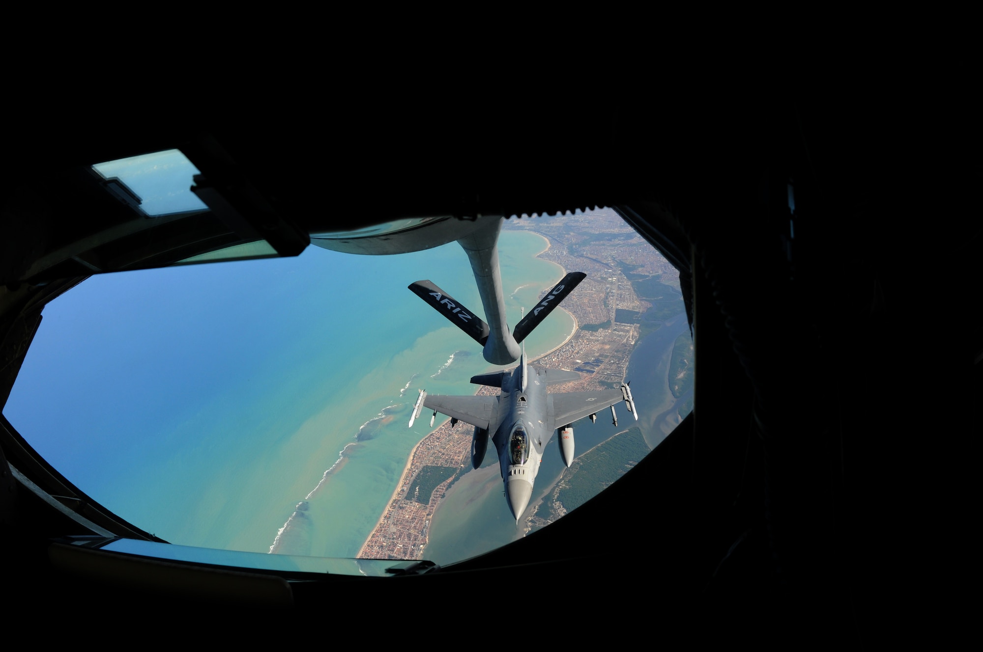 A U.S. Air Force F-16 Fighting Falcon from the 140th Fighter Wing, Buckley, Colo., approaches the boom of a KC-135 Stratotanker from the 161st Air Refueling Wing, Phoenix, Ariz., November 12, 2010, near Natal, Brazil. Both wings are participating CRUZEX V, or Cruzeiro Do Sul (Southern Cross).  CRUZEX is a multi-national combined exercise involving the Air Forces of Argentina, Brazil, Chile, France and Uruguay, and observers from numerous other countries with more than 82 aircraft and almost 3,000 Airmen involved.  U.S. Air Force Photo by Master Sgt. Kelly M. Deitloff