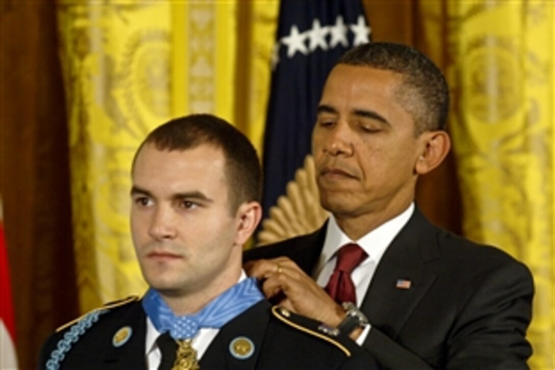 President Barack Obama presents the Medal of Honor to U.S. Army Staff Sgt. Salvatore Giunta during a ceremony at the White House, Nov.16, 2010. Giunta is the award's first living recipient since the Vietnam War.