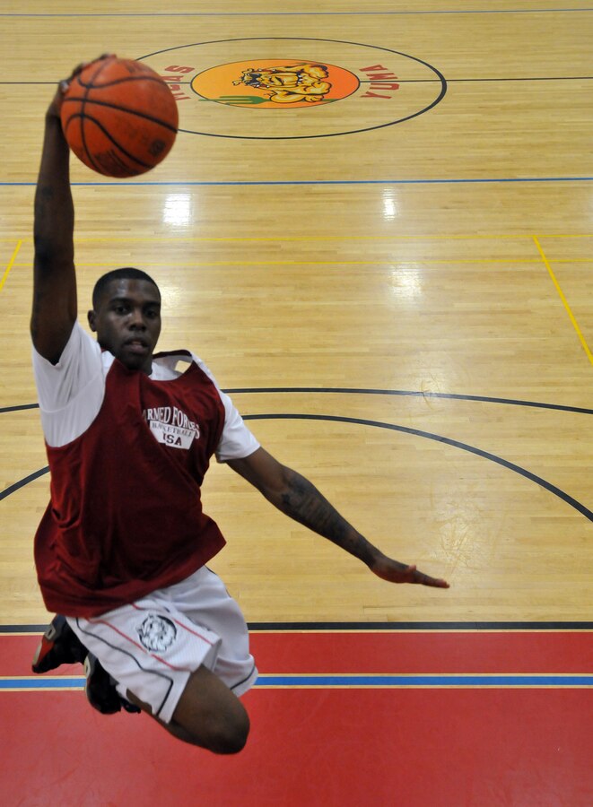 Cpl. Christopher Harris, Headquarters and Headquarters Squadron administrative clerk at Marine Corps Air Station Yuma, Ariz., has been selected twice for the West Coast Regional Tournament's first team all-tournament honors, and earned most valuable player honors in the 2010 tournament. He was invited to All-Marine basketball camp tryouts both times and was the only Marine selected for the 2010 All-Armed Forces basketball team, traveling to Seoul, Korea, as the team's starting shooting guard.