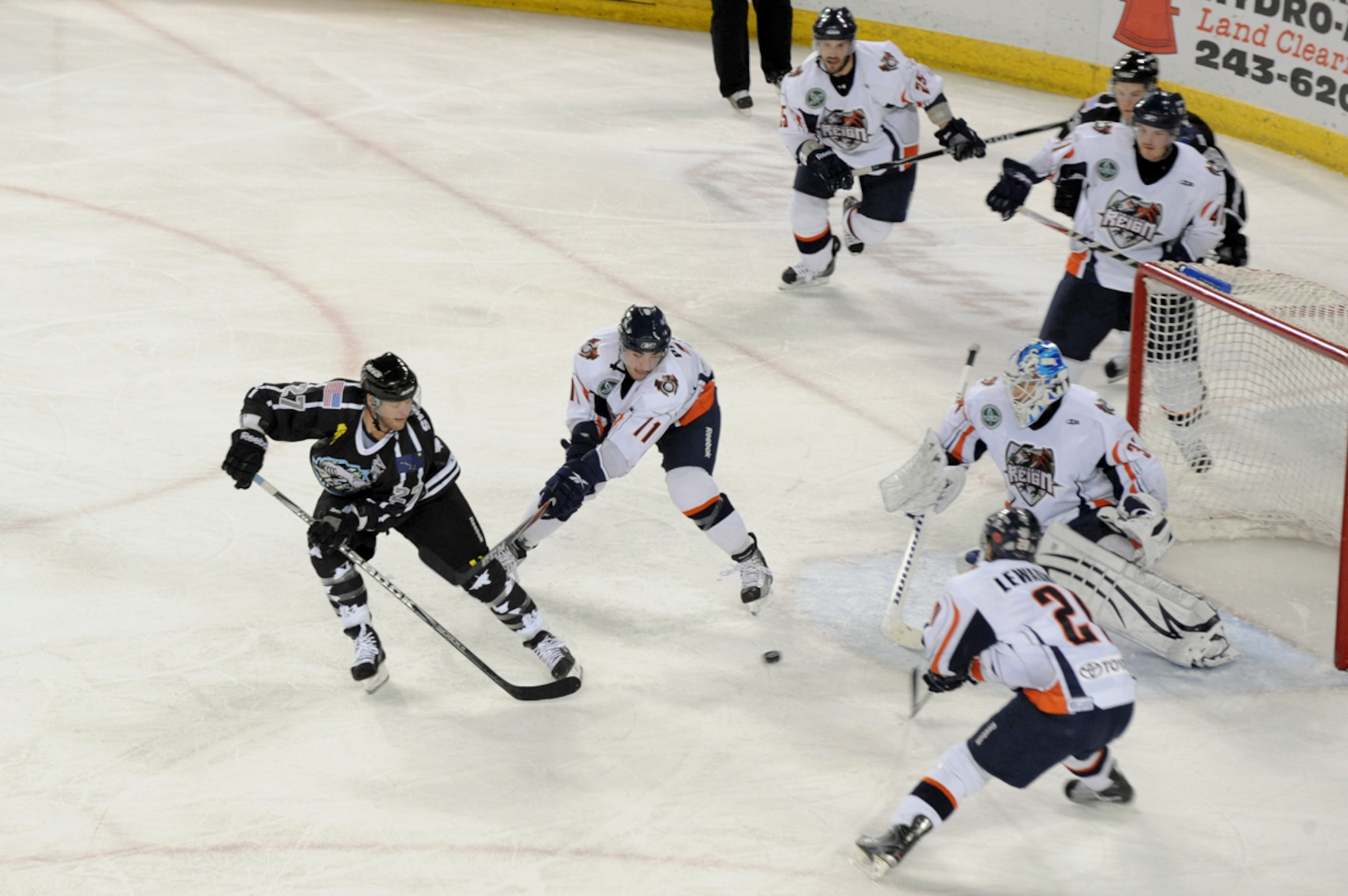 ANCHORAGE, Alaska --  Brian Swanson, the center for the Alaska Aces, attempts a shot at the goal during the military appreciation game against the Ontario Reign here, Nov. 11. The Aces played the Reign three games in a row during the military appreciation weekend. (U.S. Air Force photo by Staff Sgt. Joshua Garcia)