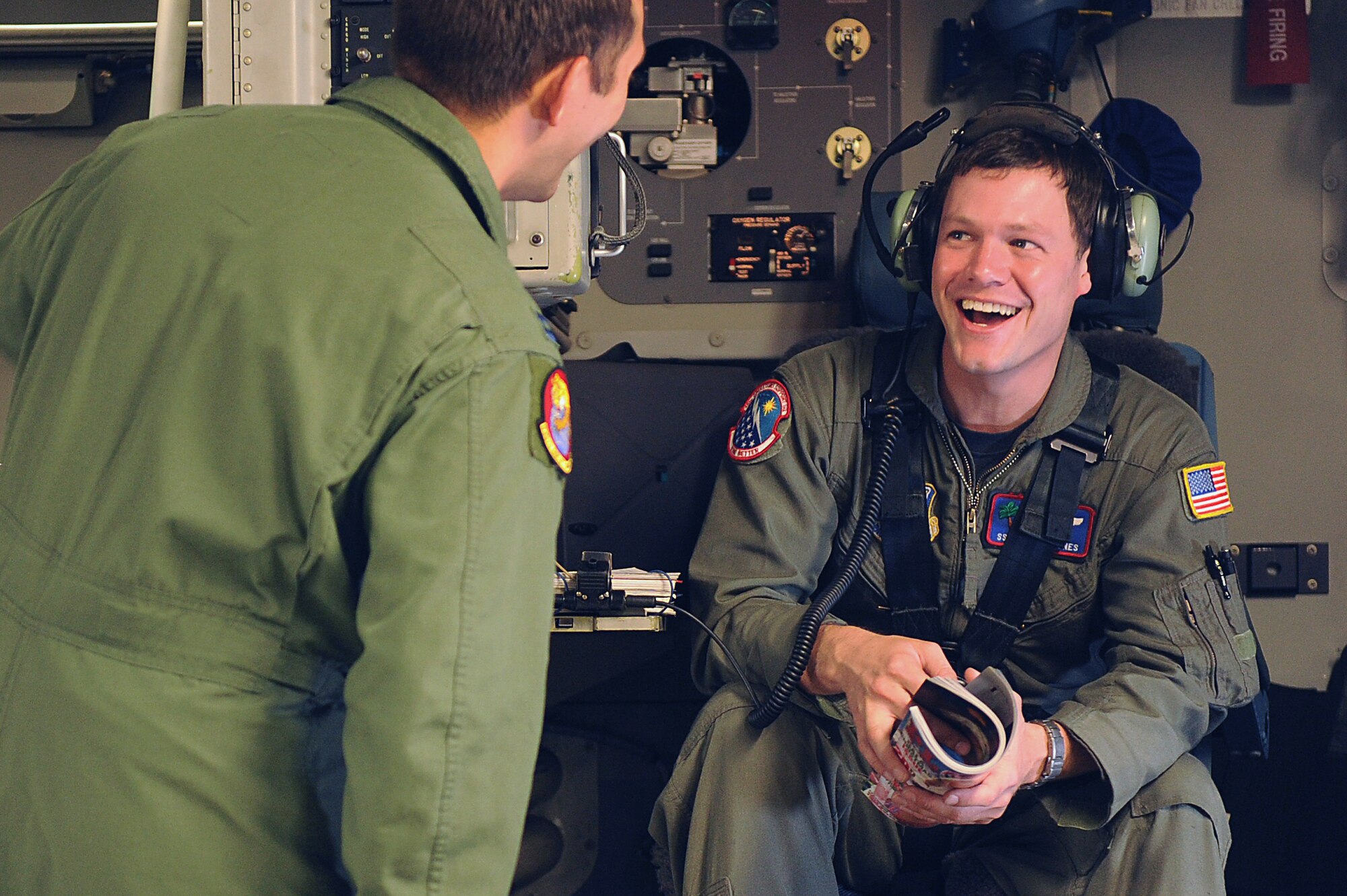 Capt. Nathan Padgett and Staff Sgt. Jason Jones, both of the 535th Airlift Squadron, have a moment of levity prior to a training mission Nov. 13, 2010, at Joint Base Lewis-McChord, Wash. A C-17 Globemaster III aircrew from the 535th AS trained in unrestricted-descent assault landings, airdrop, combat offloads, air refueling, night-vision-goggle training, low levels, mountainous terrain, assault landings, threat responses and multiple-ship formation training. (U.S. Air Force photo/Staff Sgt. Mike Meares)