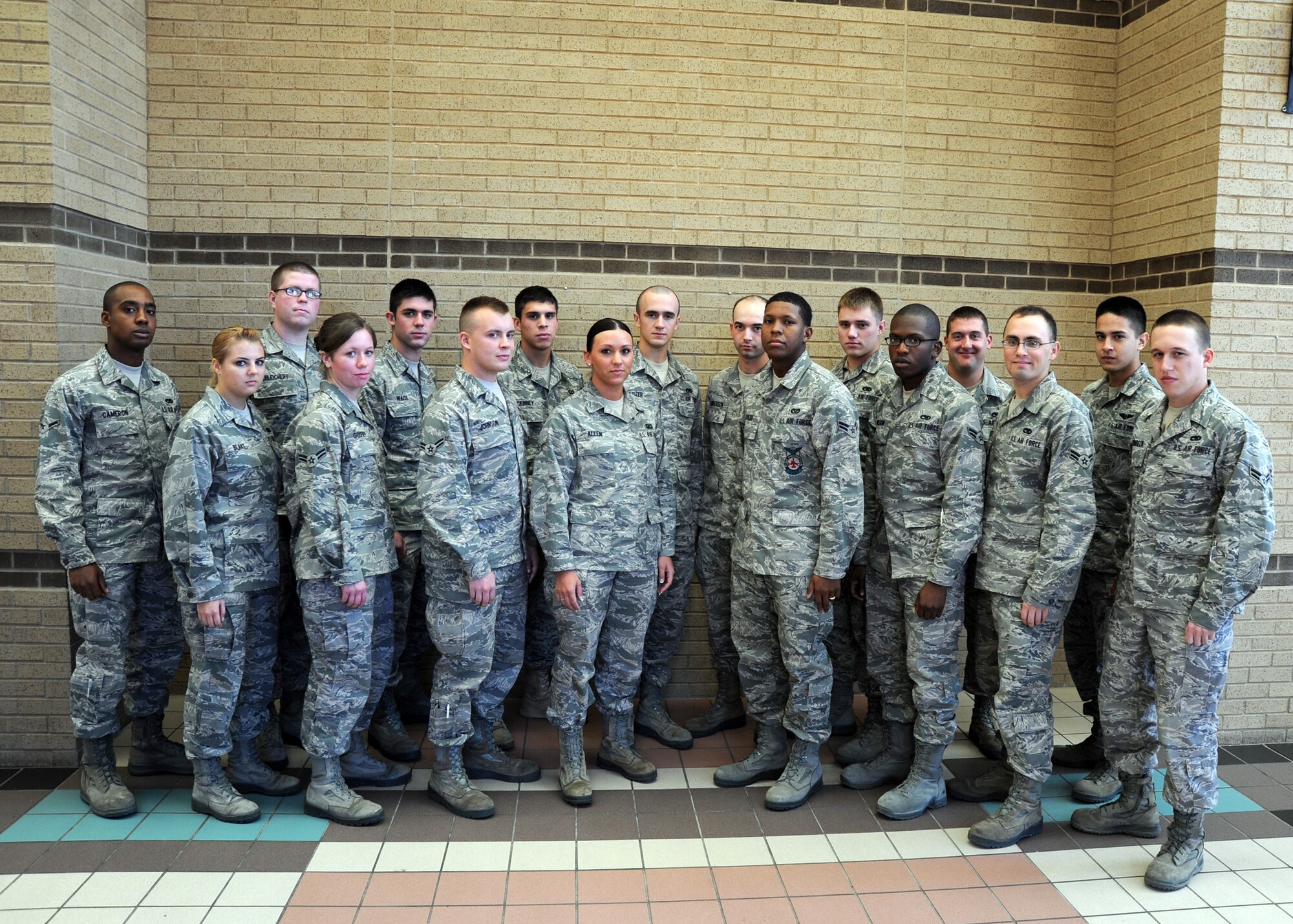 Congratulations to Team McConnell’s newest First Term Airman’s Center Airmen graduates who graduated Nov. 19, 2010, McConnell Air Force Base, Kan. Front row:  Airman Ashlie Blake, Airman 1st Class Kayla Godfrey, Christopher Johnson, Airman Lindsay Allen, Airman 1st Class DeJuan Coulter, David Wilson, Michael Berrett, and George Birnbeck.  Back row: Airman Evan Cameron, Airman 1st Class Brandon Schleichert, Logan Waite, Airman Aaron McKinney, Airman 1st Class Brandon Altizer, Curtis Anderson, Airman Jarrod Weaver, Brandon Grubidge and Airman 1st Class Chance Italiano.  (U.S. Air Force photo/Staff Sgt. Dallas Edwards)