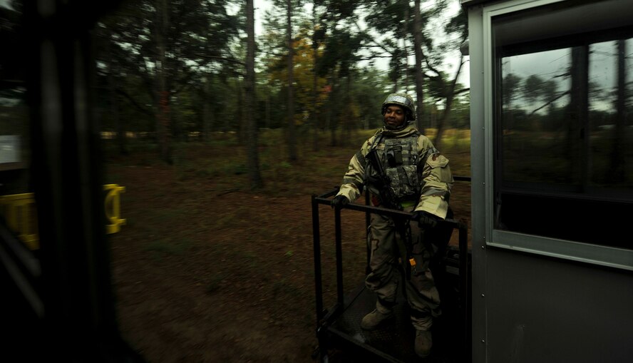 MOODY AIR FORCE BASE, Ga.-- Senior Airman Benjamin Taylor, 23rd Wing Security Forces Squadron patrolman, guards an entry control point during a Phase II Operational Readiness Exercise Nov. 16. Security forces members were spread across the site to provide protection for Base X during the exercise. (U.S. Air Force Photo/Airman 1st Class Joshua Green)(RELEASED)   