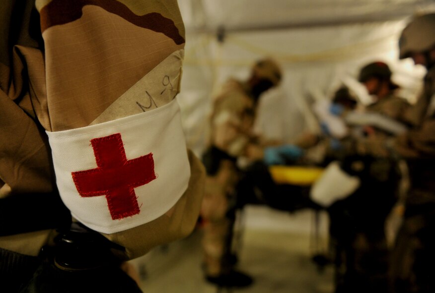 MOODY AIR FORCE BASE, Ga.-- Airmen from the 23rd Medical Group provide medical care to a patient during an evacuation situation during a Phase II Operational Readiness Exercise Nov. 16. Members from the 23rd MDG were tasked with three casualty victims: two wounded in battle and one nonbattle injury. (U.S. Air Force Photo/Airman 1st Class Joshua Green)(RELEASED)          